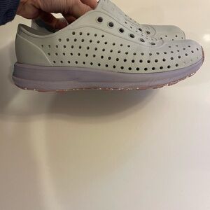 Light Gray Native Slip-On Sneakers with Lavender Midsole.
